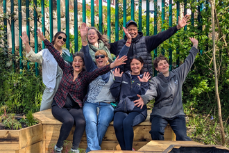 Smiles all round in the Peace Garden