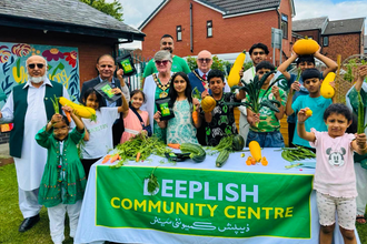 The Deeplish crew celebrating a bumper summer harvest with Mayor of Rochdale Janet Emsley