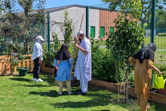 The garden is cared for by community members of all ages