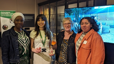 A group of women from various Green Spaces Fund projects enjoying the event