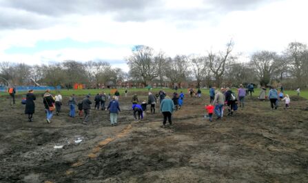 Community seed sowing, March 2025. Photo credit: Friends of Chorlton Park