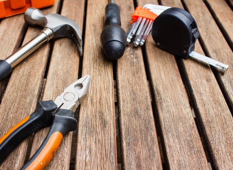 Tools laid out on a wooden table