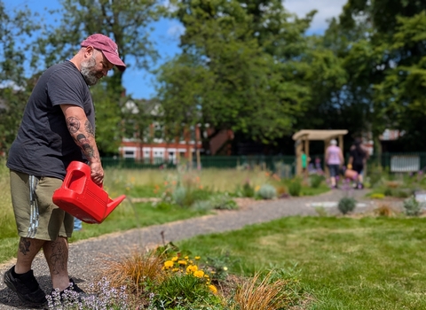 SNUG Man Watering